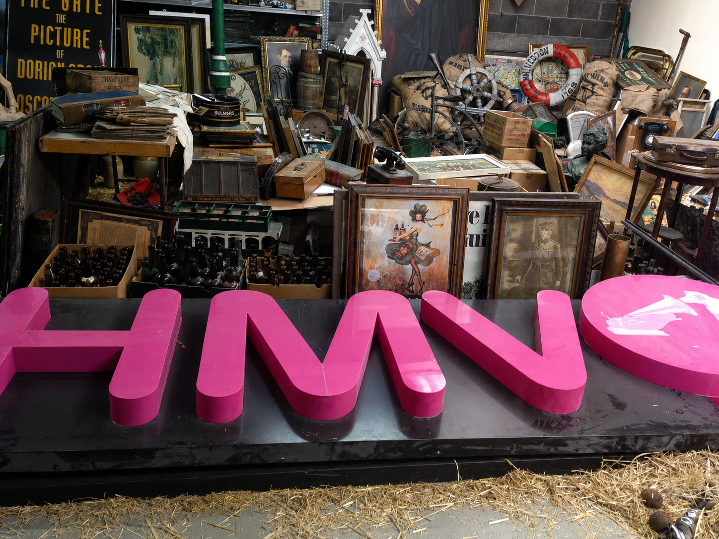 Rescued contents of traditional Irish pubs stored at Rare Irish Stuff, including vintage brewery signs, pub mirrors, vintage posters and prints, whiskey crates and historic pub memorabilia preserved from pubs across Ireland.