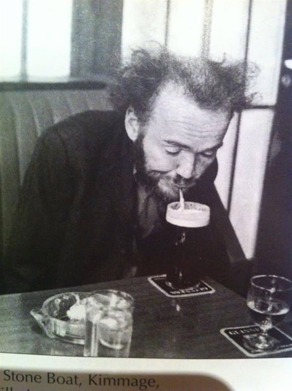 Christy Brown enjoying a pint in his local.